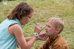 Kid face painter.