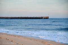 Already the pier was filled with fishers.