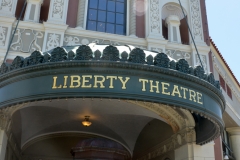 Old theatre with an intricately carved facade.