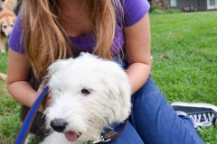 Sharon's granddaughter and her new puppy, Winnie.